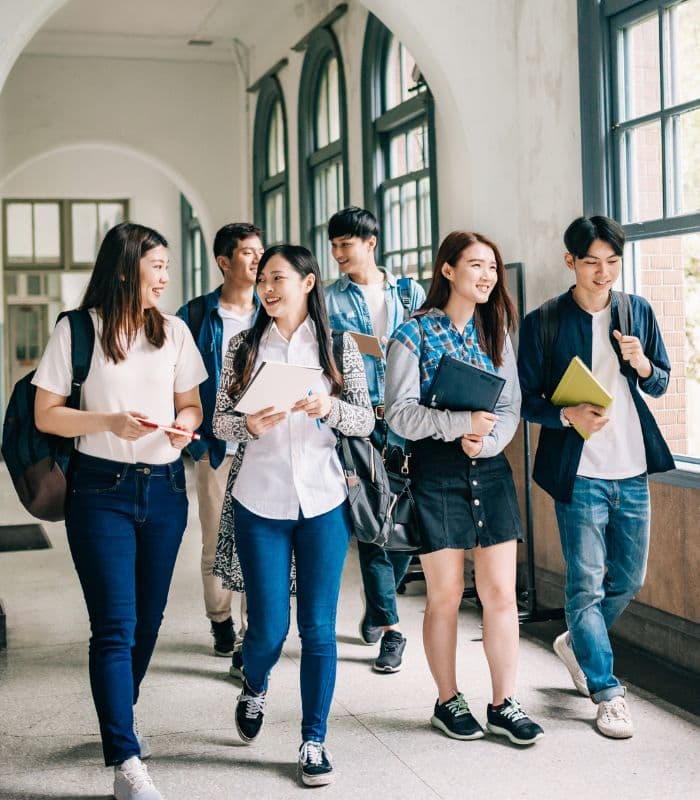 Group of students walking on campus